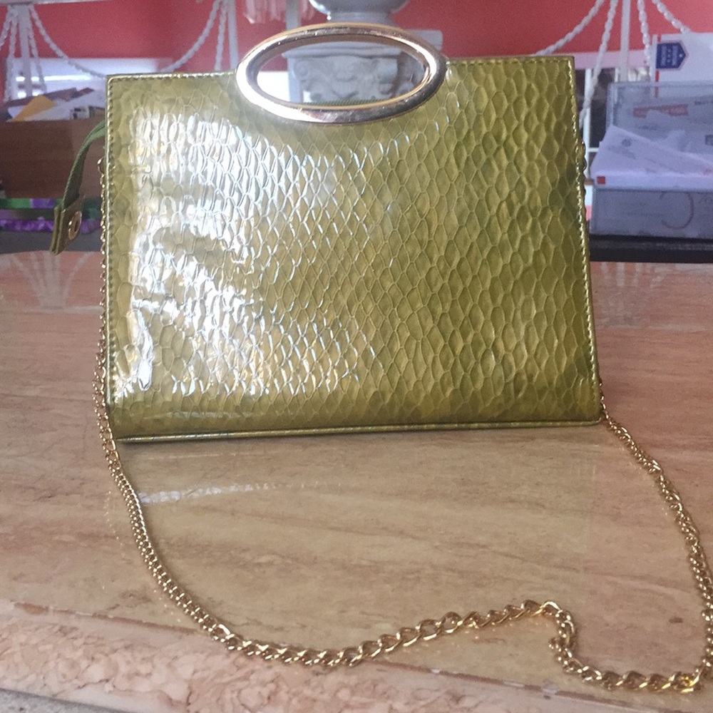 Lime green purse with a gold chain